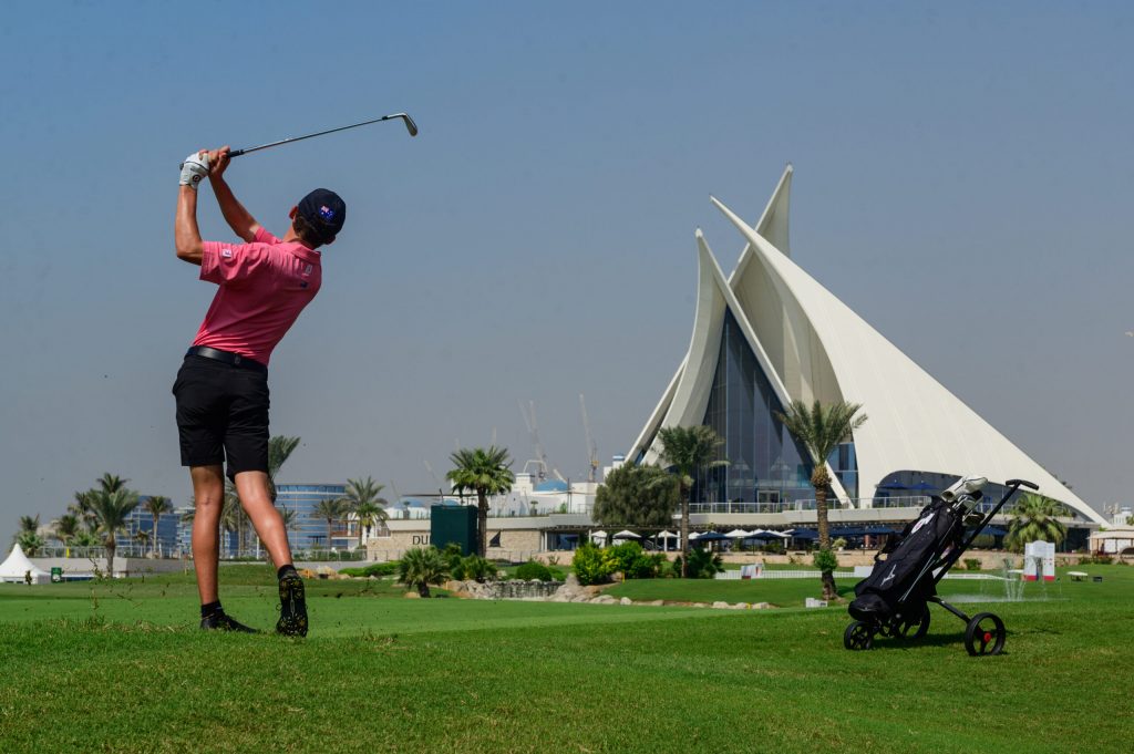 Connor McKinney of Australia in action on the 18th during a practice round ahead of the 2021 Asian Amateur Championship being played on the Dubai Creek Golf and Yacht Club, in Dubai, United Arab Emirates on Tuesday, November 2, 2021. Photograph by AAC
